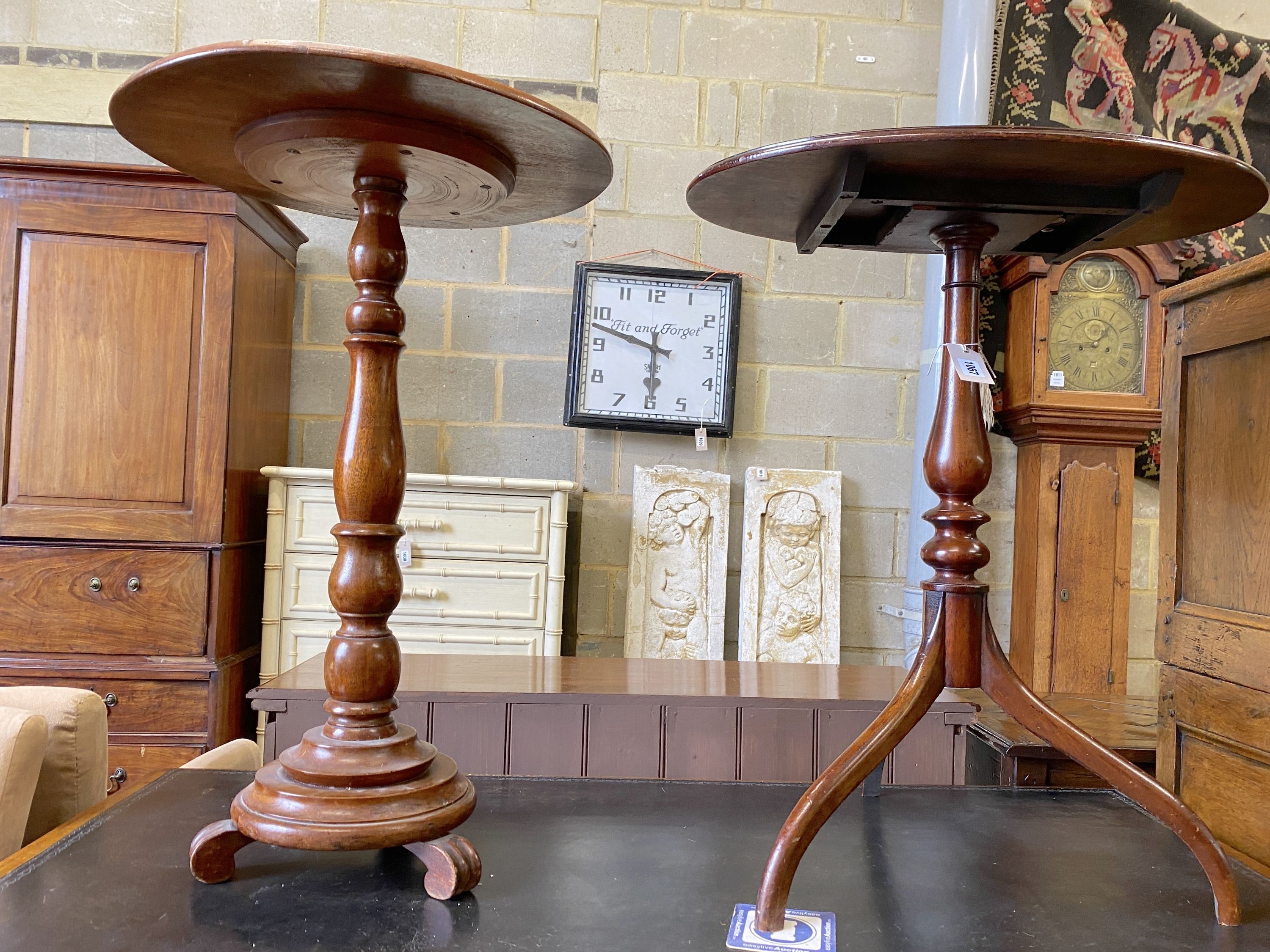 A Victorian circular mahogany wine table, diameter 50cm, height 76cm together with an oval tilt top tripod table